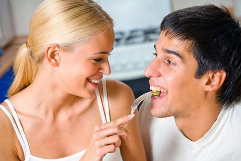 Women feed men products to stimulate sexual performance